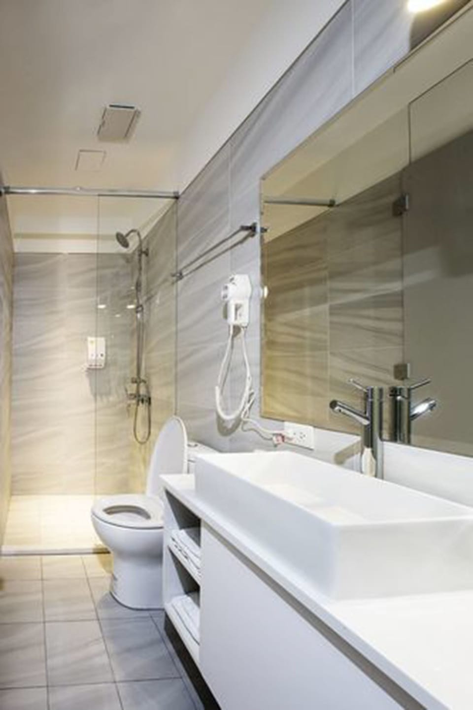 Shower, free toiletries, hair dryer, slippers