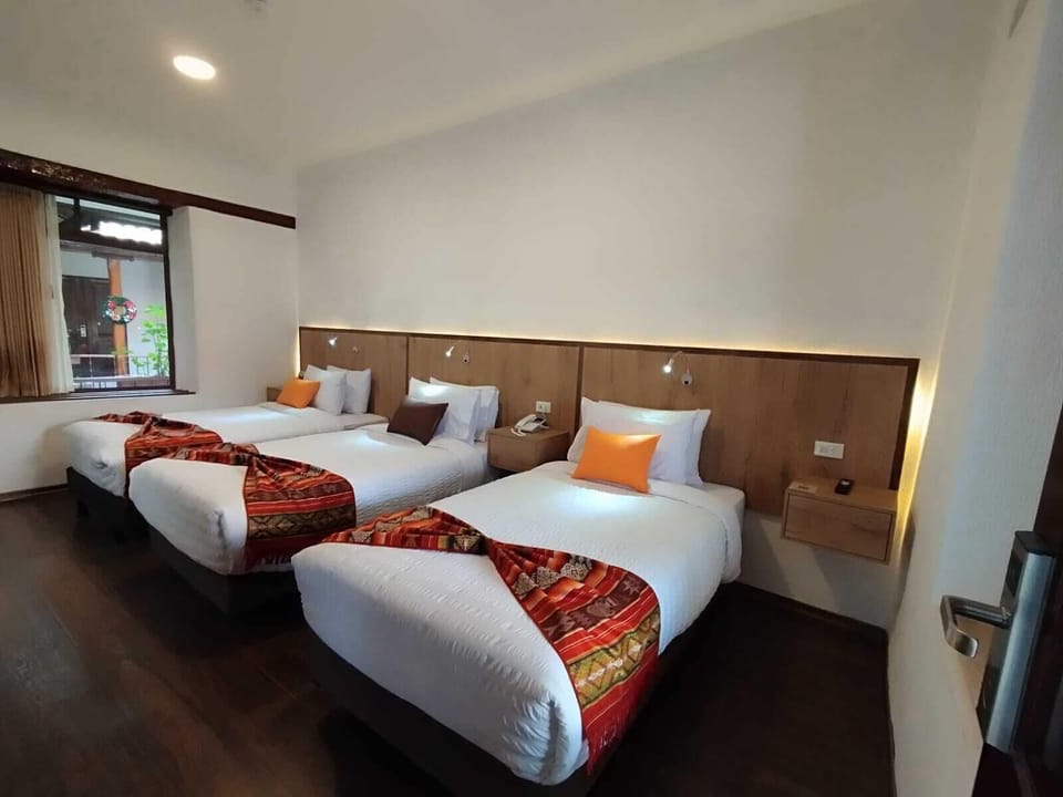 Basic Triple Room, Garden View | Premium bedding, down comforters, in-room safe, laptop workspace