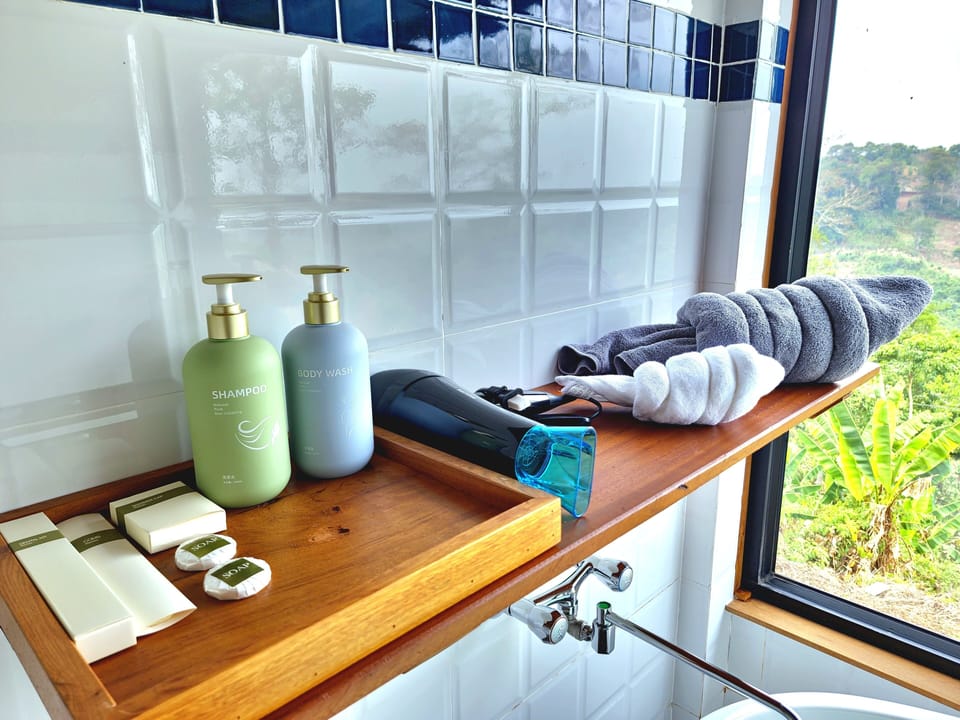 Family Suite | Bathroom amenities | Shower, rainfall showerhead, hair dryer, bathrobes
