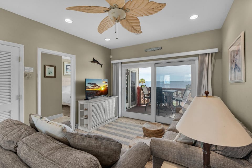 Condo, Multiple Beds (Baywatch C8) | Living area | TV