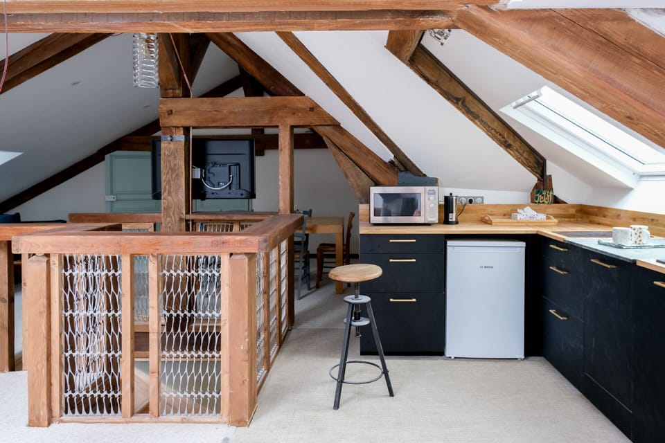 Classic Penthouse, Ensuite (A La Belle Étoile ) | Private kitchen | Highchair