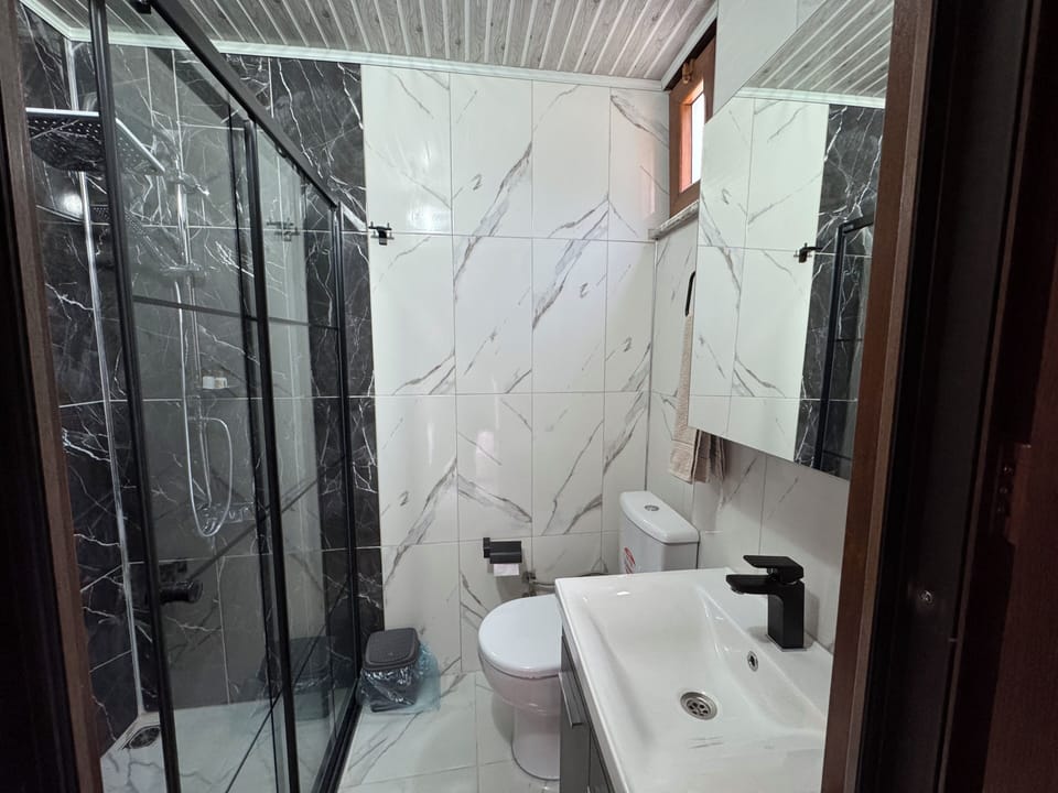 Comfort Room | Bathroom | Shower, rainfall showerhead, hair dryer, slippers