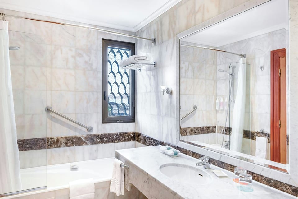 Rainfall showerhead, free toiletries, hair dryer, bathrobes