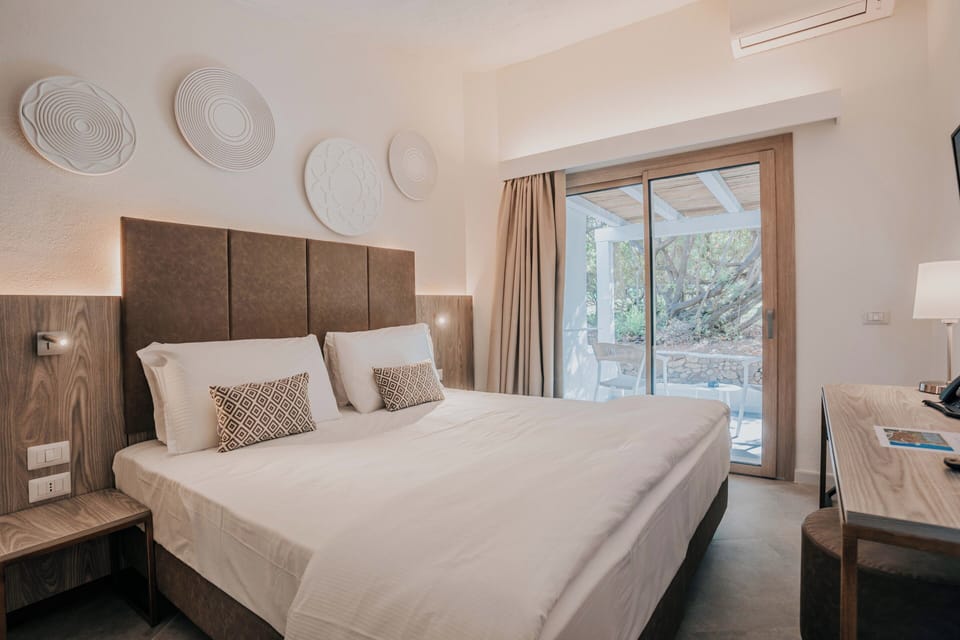 Superior Double Room | Down comforters, minibar, in-room safe, desk