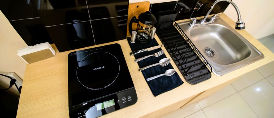 Deluxe Apartment | Private kitchen | Fridge, coffee/tea maker, toaster, mixer