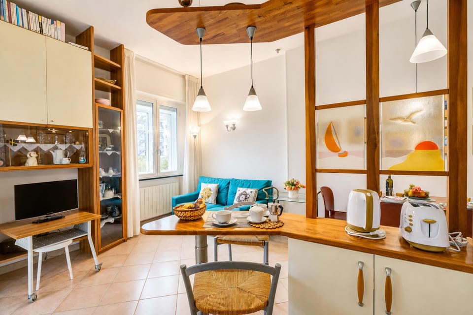 Family Apartment, 1 Bedroom, Balcony, Sea Facing (Gabri By The Sea with Balcony and) | Living area | Flat-screen TV