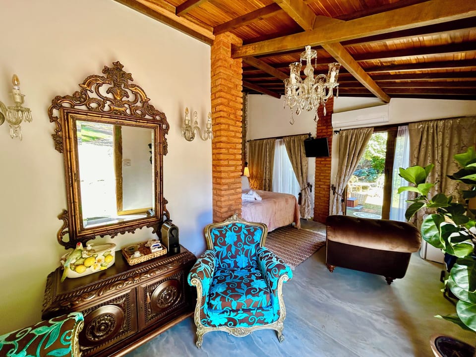 Luxury Suite, Garden View | Living area | Toys, smart speakers