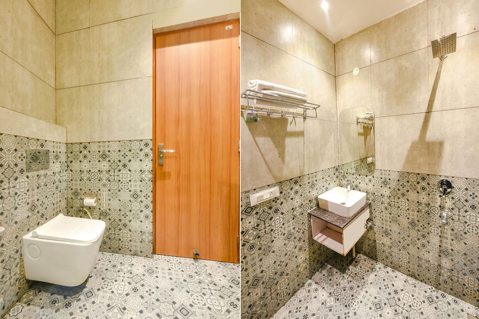 Executive Room | Bathroom | Shower, rainfall showerhead, free toiletries, towels