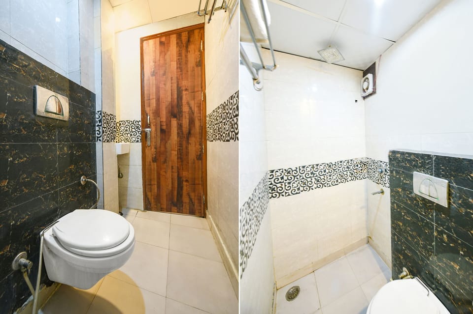 Deluxe Room | Bathroom | Shower, rainfall showerhead, free toiletries, towels