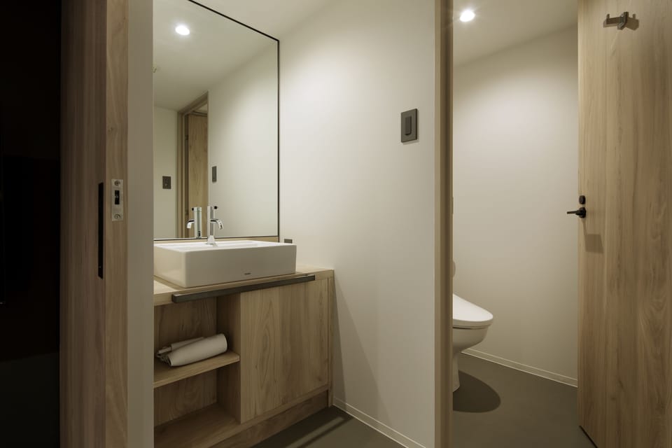 Family Room (Ensuite Bathroom, 2 bunk beds + 1 sofa bed) | Bathroom | Free toiletries, slippers, bidet, towels