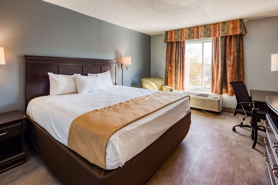 Pillowtop beds, desk, laptop workspace, blackout drapes