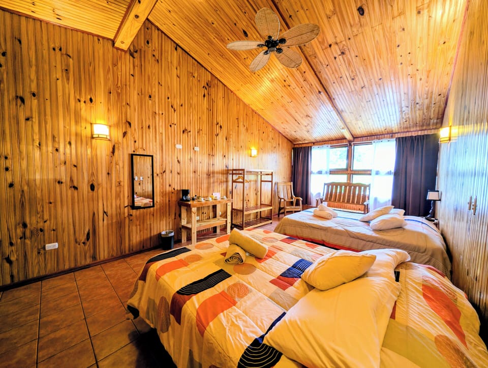 Superior Quadruple Room, Garden View | Hypo-allergenic bedding, down comforters, minibar, iron/ironing board