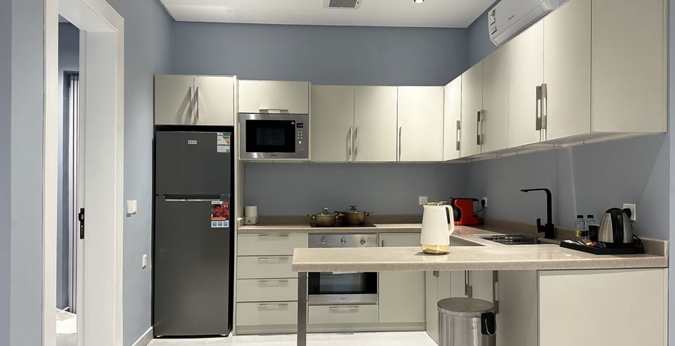Design Apartment, 3 Bedrooms | Private kitchen | Electric kettle