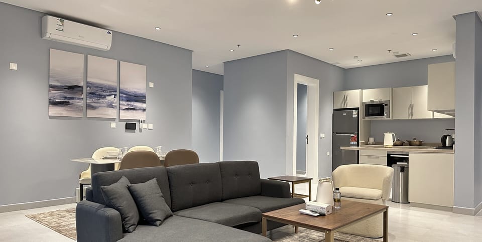 Design Apartment, 3 Bedrooms | Living area | Flat-screen TV
