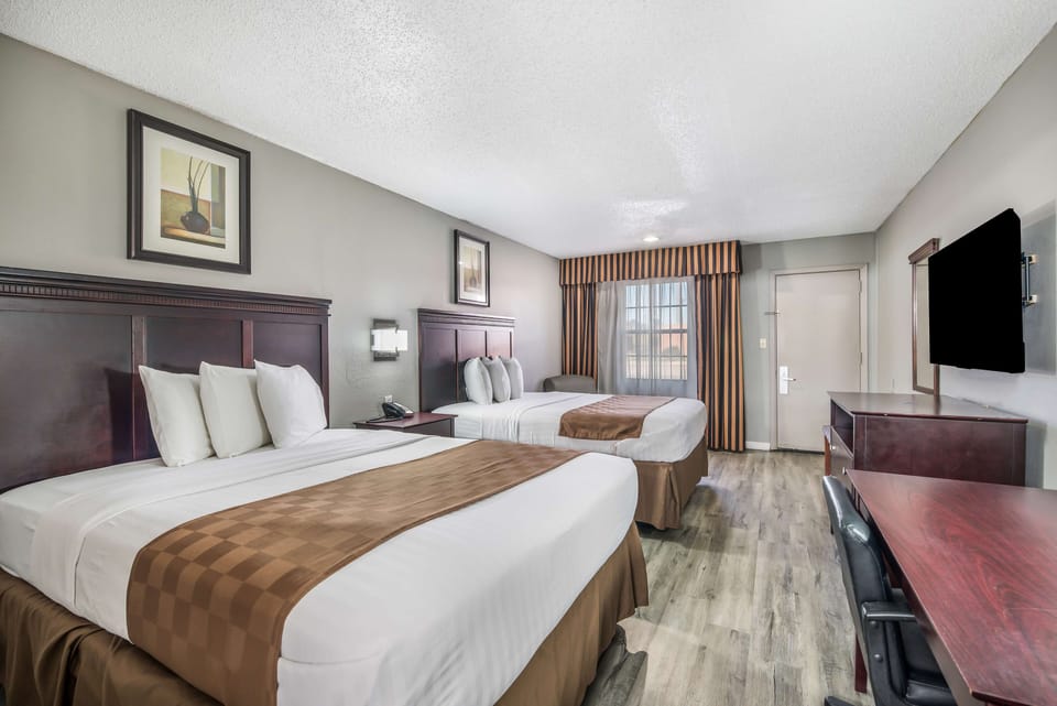 Deluxe Room, 2 Queen Beds, Non Smoking | Desk, rollaway beds, free WiFi, bed sheets
