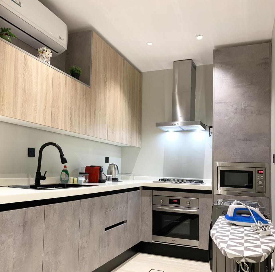 Design Apartment, 3 Bedrooms | Private kitchen | Microwave, electric kettle