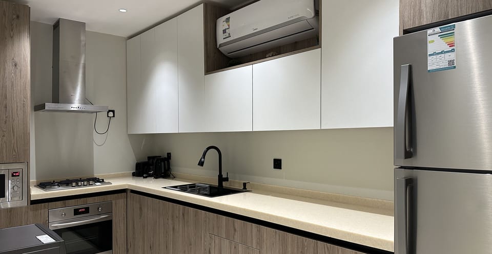 Design Apartment, 3 Bedrooms | Private kitchen | Electric kettle, eco-friendly cleaning products, paper towels