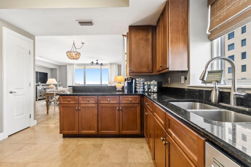 Condo, Multiple Beds (Indigo East 406) | Private kitchen | Oven, toaster, paper towels