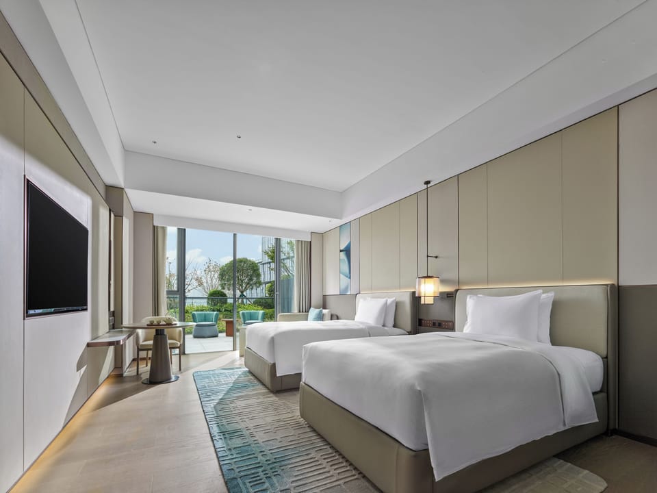 Deluxe Room, 2 Twin Beds with private garden | Down comforters, in-room safe, desk, laptop workspace