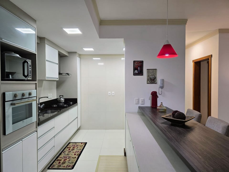Traditional Apartment | Private kitchen | Full-size fridge, microwave, toaster oven, cookware/dishes/utensils