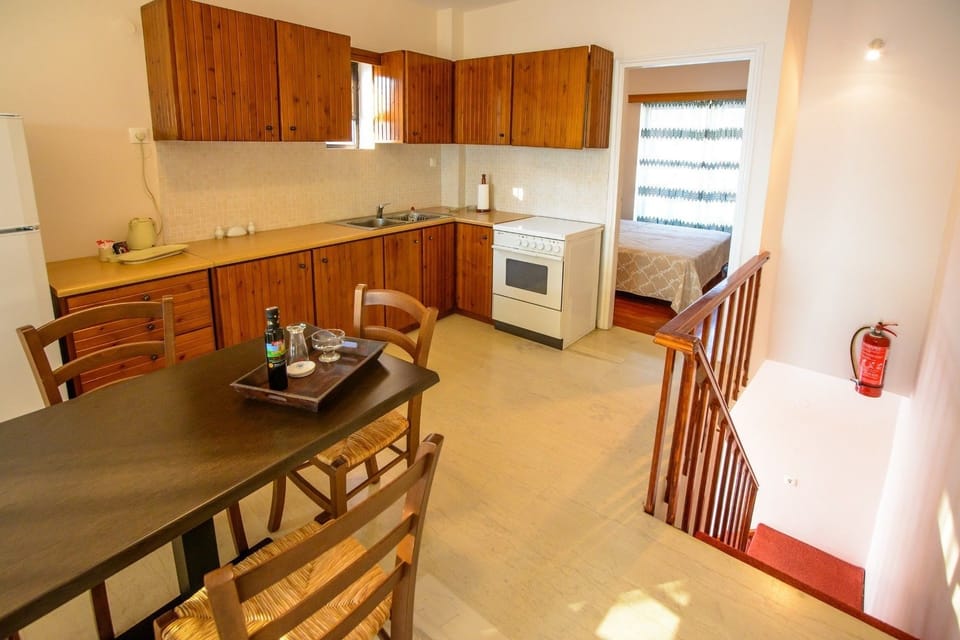 Apartment, 2 Bedrooms, Sea View | Private kitchen | Fridge, stovetop, electric kettle, cookware/dishes/utensils