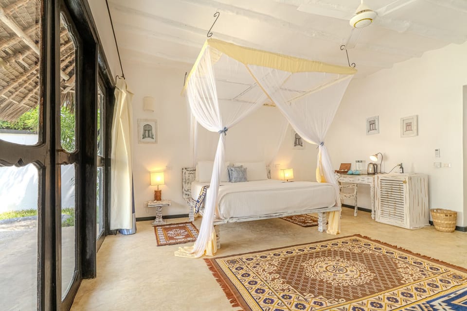 Family Suite, Garden View | Premium bedding, minibar, in-room safe, desk