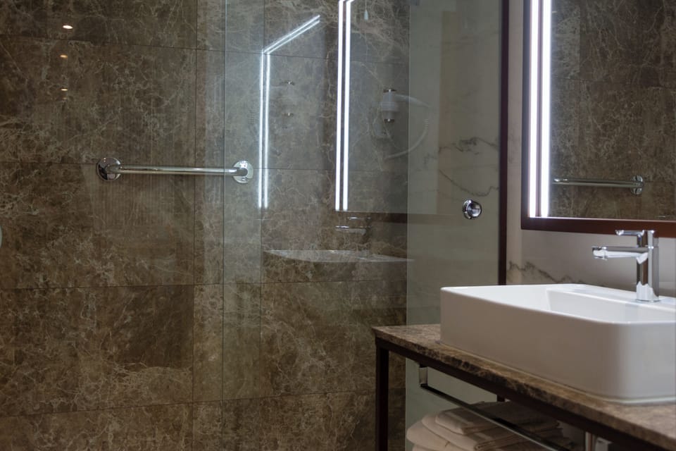 Rainfall showerhead, free toiletries, hair dryer, bathrobes