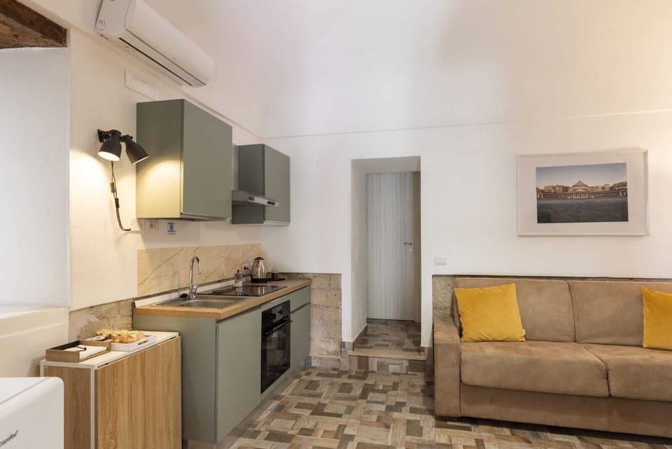Deluxe Apartment | Living area | Flat-screen TV