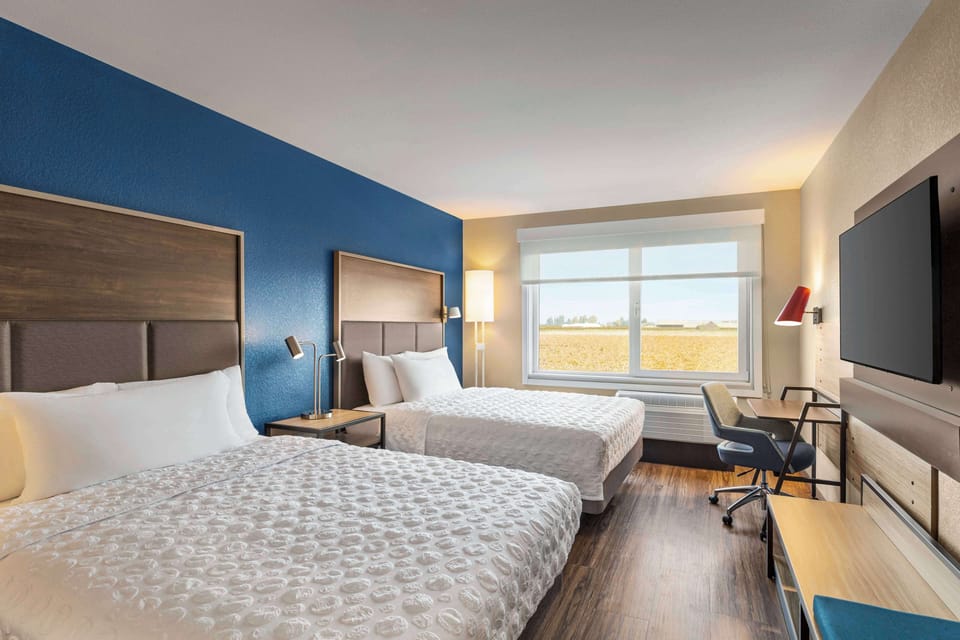 Room, 2 Queen Beds | Iron/ironing board, free WiFi, bed sheets