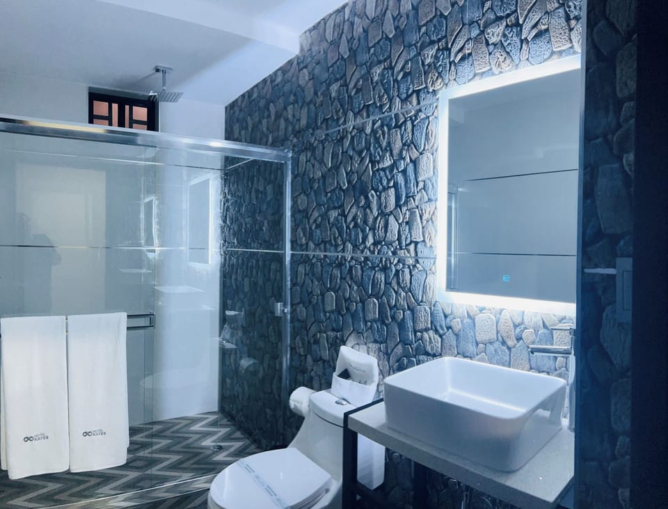 Bathtub, towels, soap, shampoo