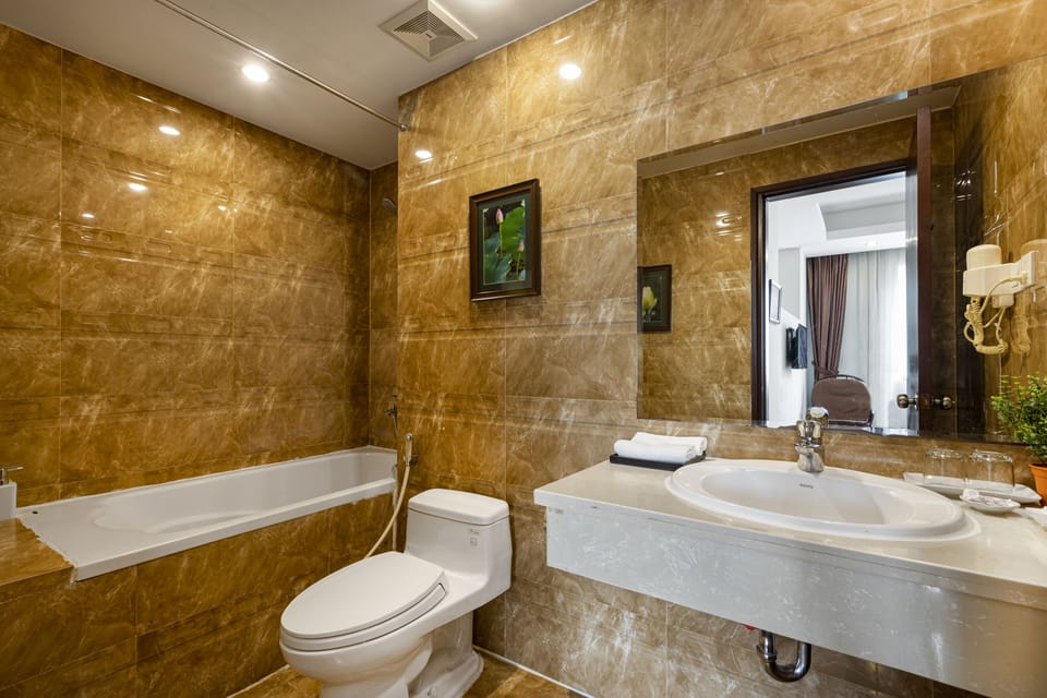 Combined shower/tub, deep soaking tub, hair dryer, bathrobes