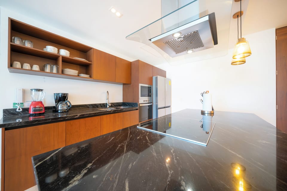 Deluxe Apartment, 3 Bedrooms | Private kitchen | Full-size fridge, microwave, toaster
