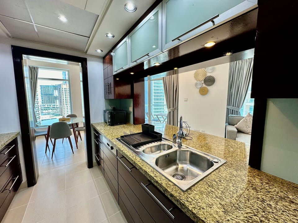 Family Apartment, Balcony, City View | Private kitchen | Fridge, microwave, oven, stovetop