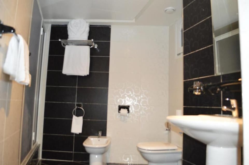 Shower, towels, soap, shampoo