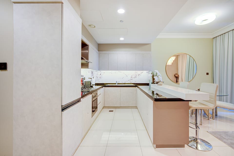 Deluxe Apartment | Private kitchen | Full-size fridge, microwave