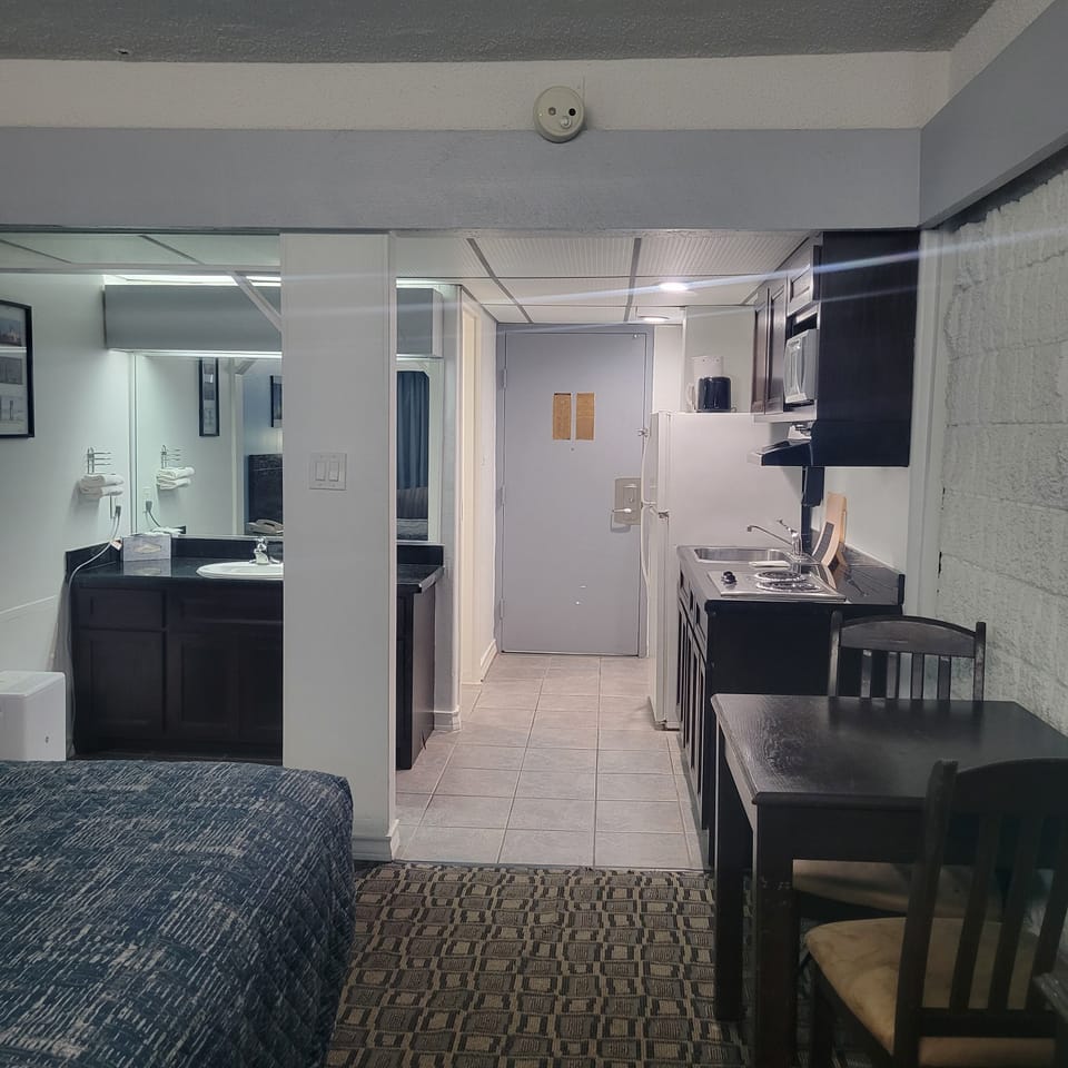 North King Bed, Kitchen Partial View (No Pets Allowed) | Private kitchenette | Fridge, microwave, cookware/dishes/utensils