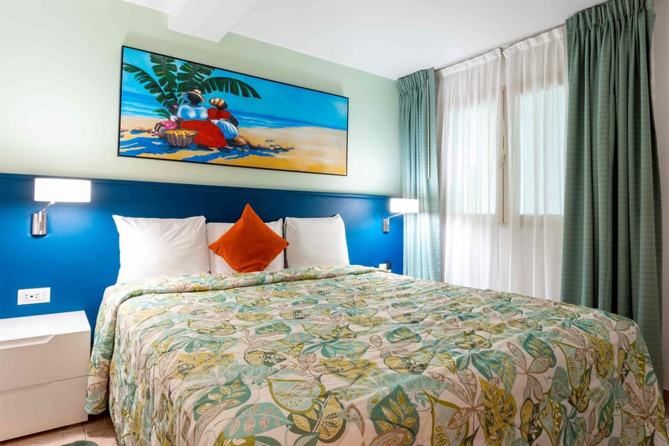 Suite, 1 Bedroom, Balcony, Ocean View | Hypo-allergenic bedding available, in-room safe, desk, blackout drapes