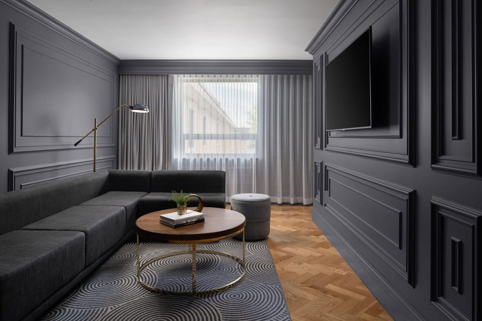 Junior Suite, 1 King Bed | Living area | 47-inch flat-screen TV with satellite channels, TV