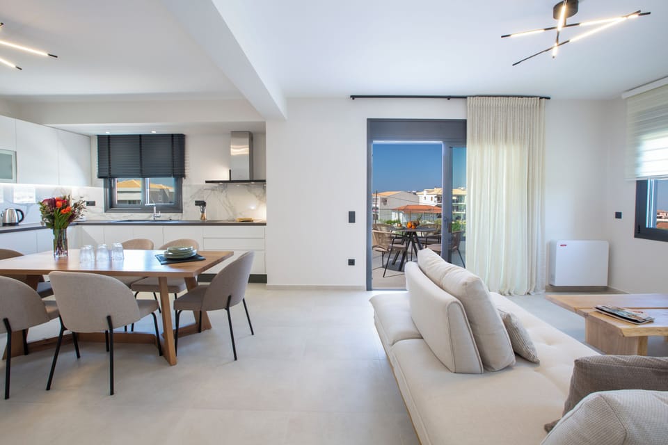 Suite, 2 Bedrooms | Living area | 50-inch LED TV with premium channels