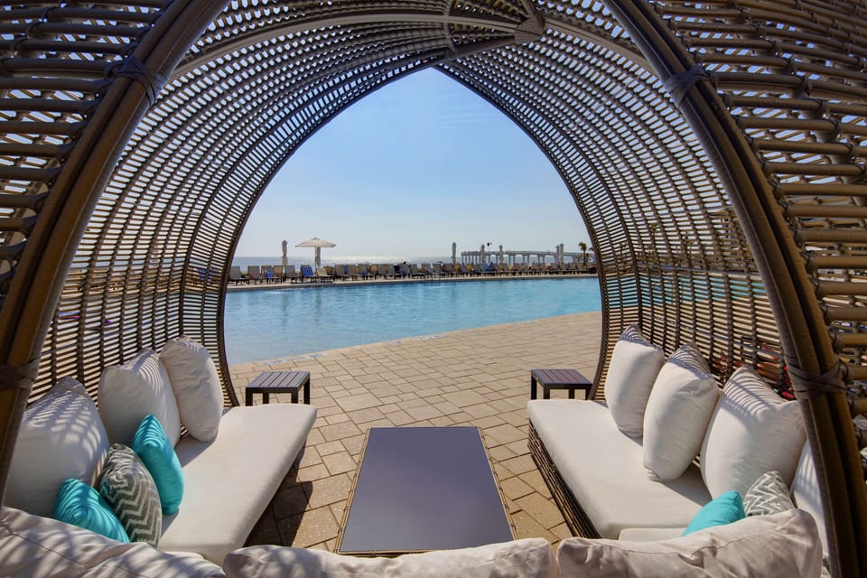 Outdoor pool, open 9:00 AM to 7:00 PM, sun loungers