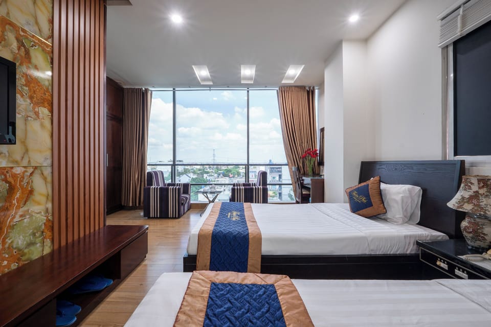 Family Triple Room, Multiple Beds, City View | Premium bedding, memory foam beds, minibar, in-room safe