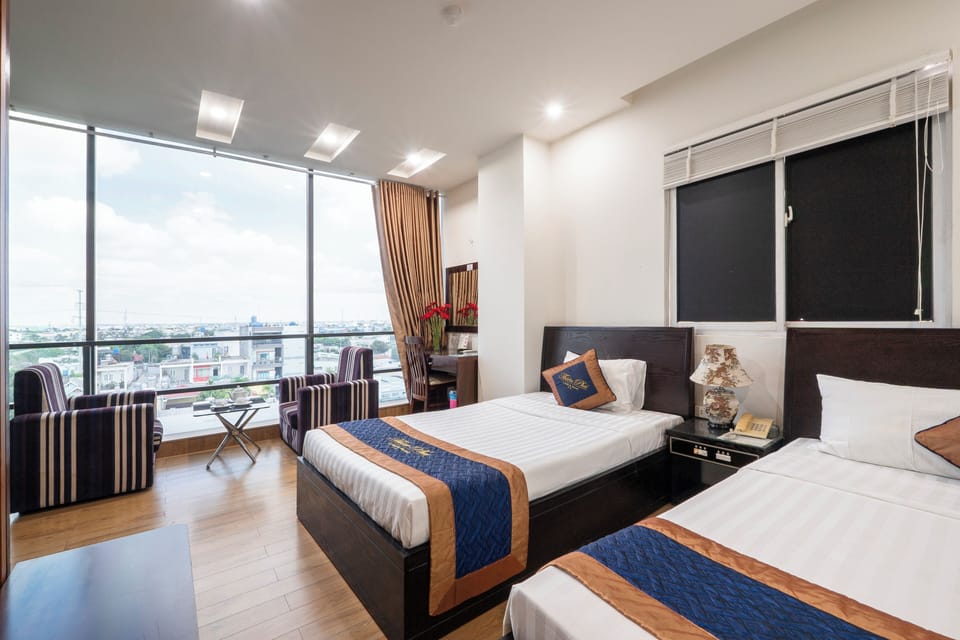Family Triple Room, Multiple Beds, City View | Premium bedding, memory foam beds, minibar, in-room safe