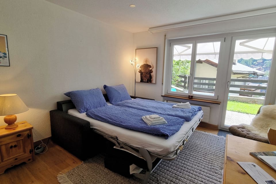 Comfort Apartment | Living area | Flat-screen TV