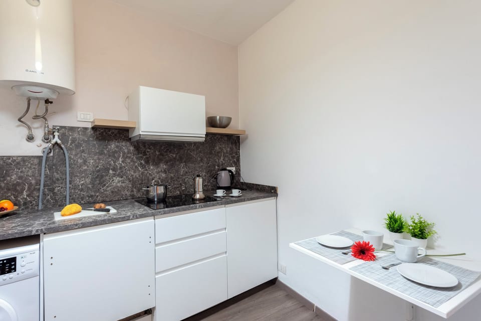 Family Apartment, Multiple Bedrooms (Cozy Maria Apartment in Portofino) | Private kitchen | Fridge, microwave, stovetop, dishwasher
