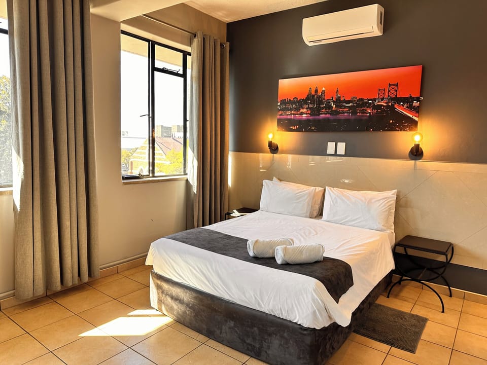 Deluxe Room | 1 bedroom, blackout drapes, free WiFi, bed sheets