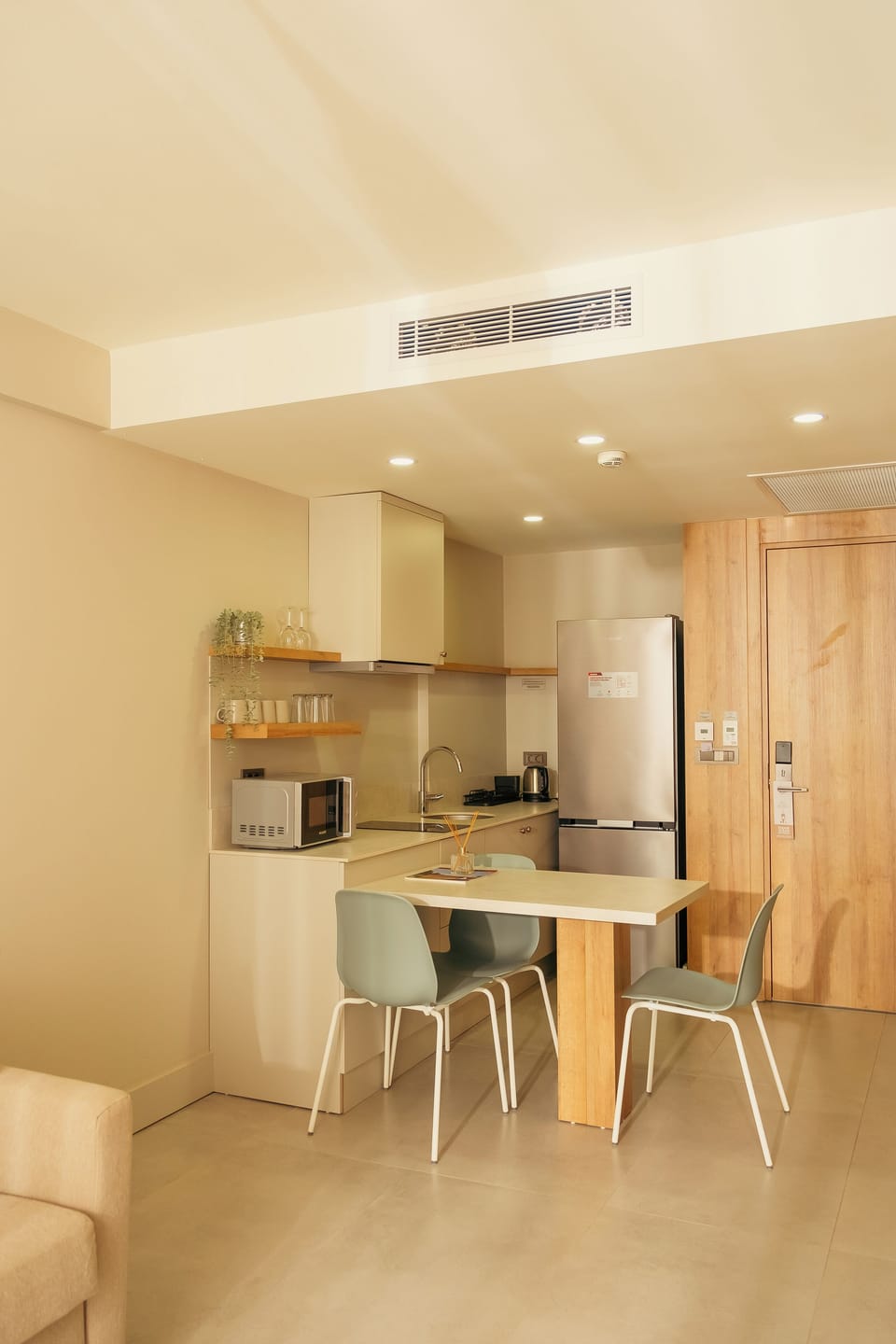 Deluxe Suite, Balcony | Living area | TV, heated floors