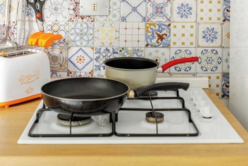 Family Apartment | Private kitchen | Electric kettle, highchair