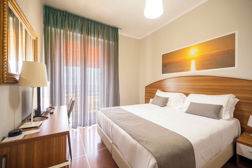 Superior Double Room, Sea View | Minibar, in-room safe, desk, blackout drapes