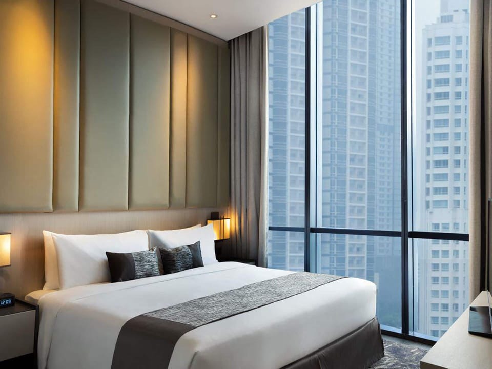 In-room safe, laptop workspace, blackout drapes, soundproofing
