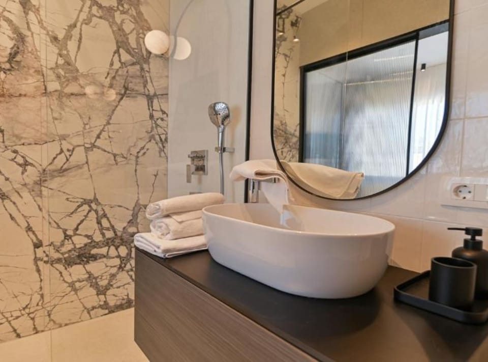 Villa (Five bedroom Villa with Terrace and S) | Bathroom | Shower, bathrobes, slippers, towels